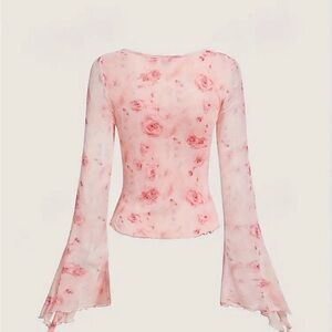 Cute rose and pink criss cross long sleeve y2k shirt.